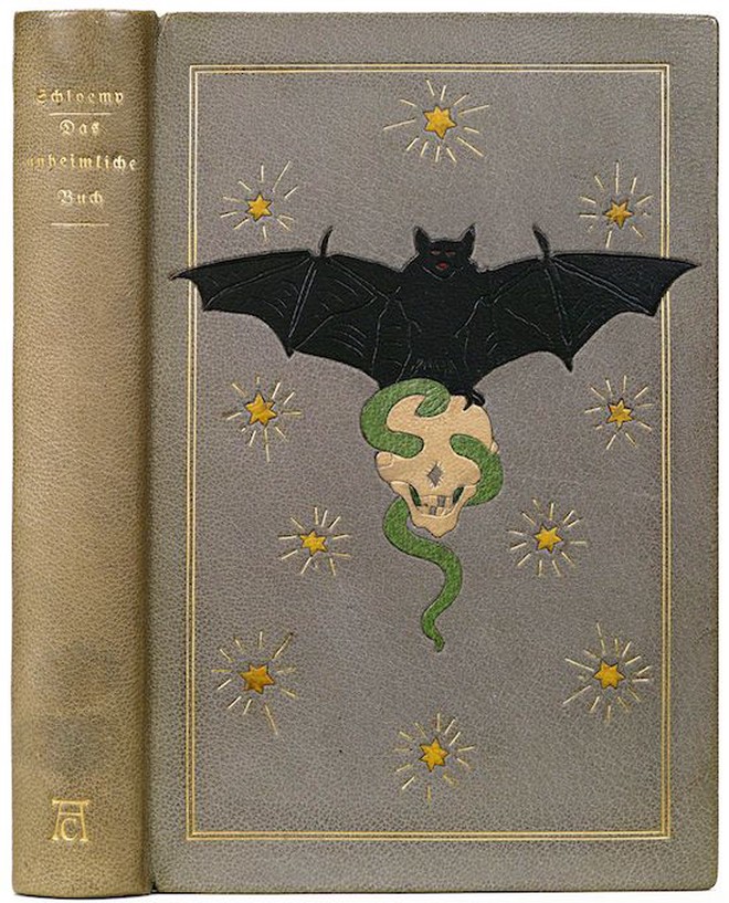 Embossed cover design of a bat carrying a skull that has a green worm threaded through its eyes