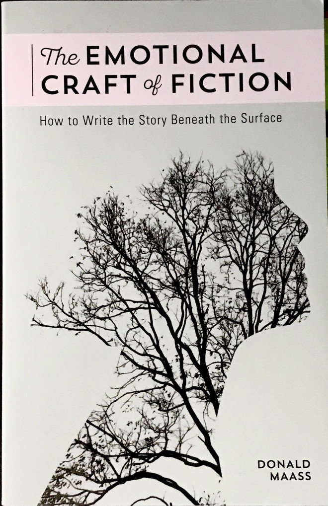Book cover for The Emotional Craft of Fiction, by Donald Maass, with a silhouette of a face in profile made up of tree branches